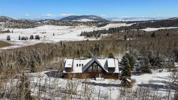 a view of houses with outdoor space and city view