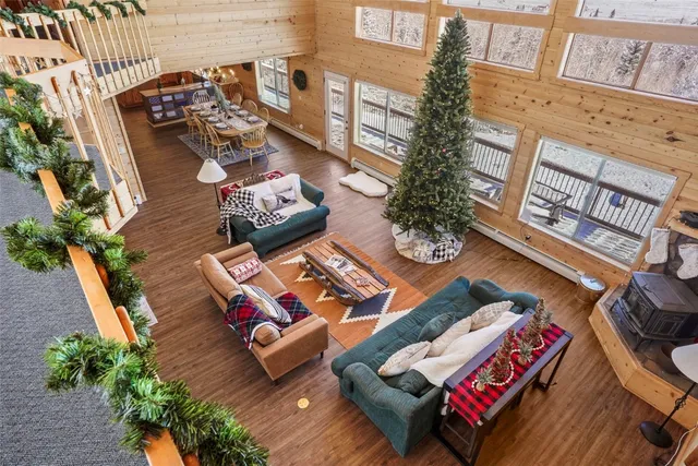 a view of a couch in patio with wooden floor