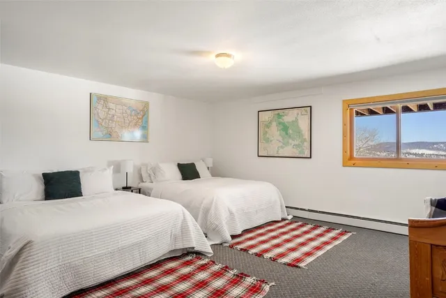 a view of house with backyard