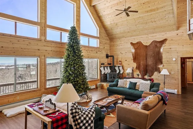 a outdoor living space with furniture and a fireplace