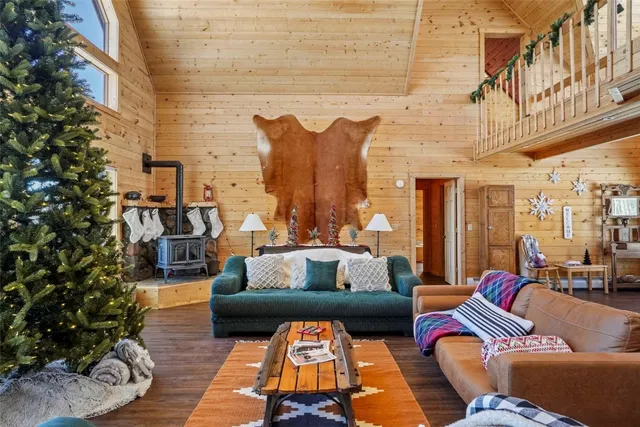 a outdoor living space with furniture and a fireplace