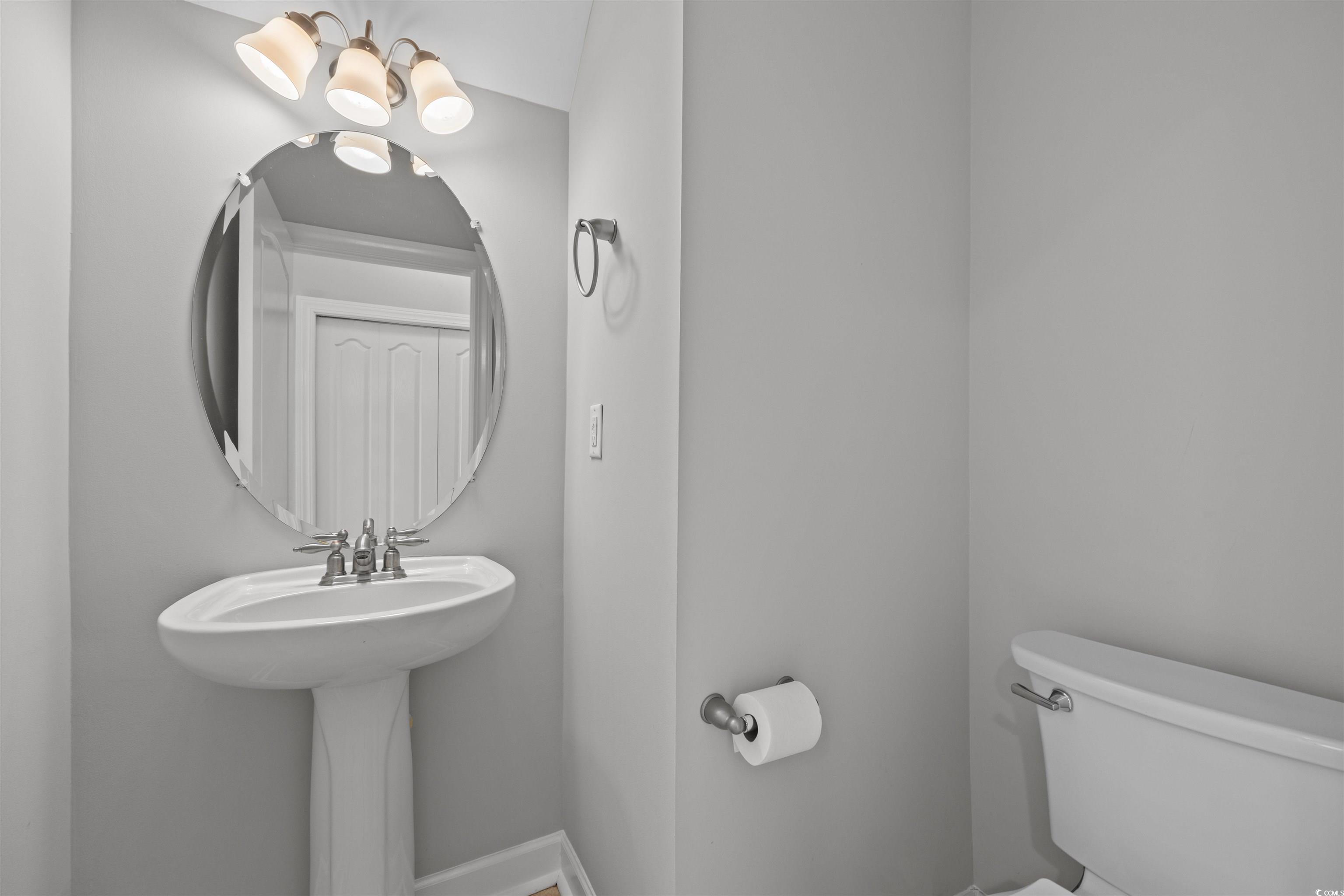 1060 Fairway Lane Conway, SC 29526 - Photo 24 of 32 Half bath featuring toilet and baseboards