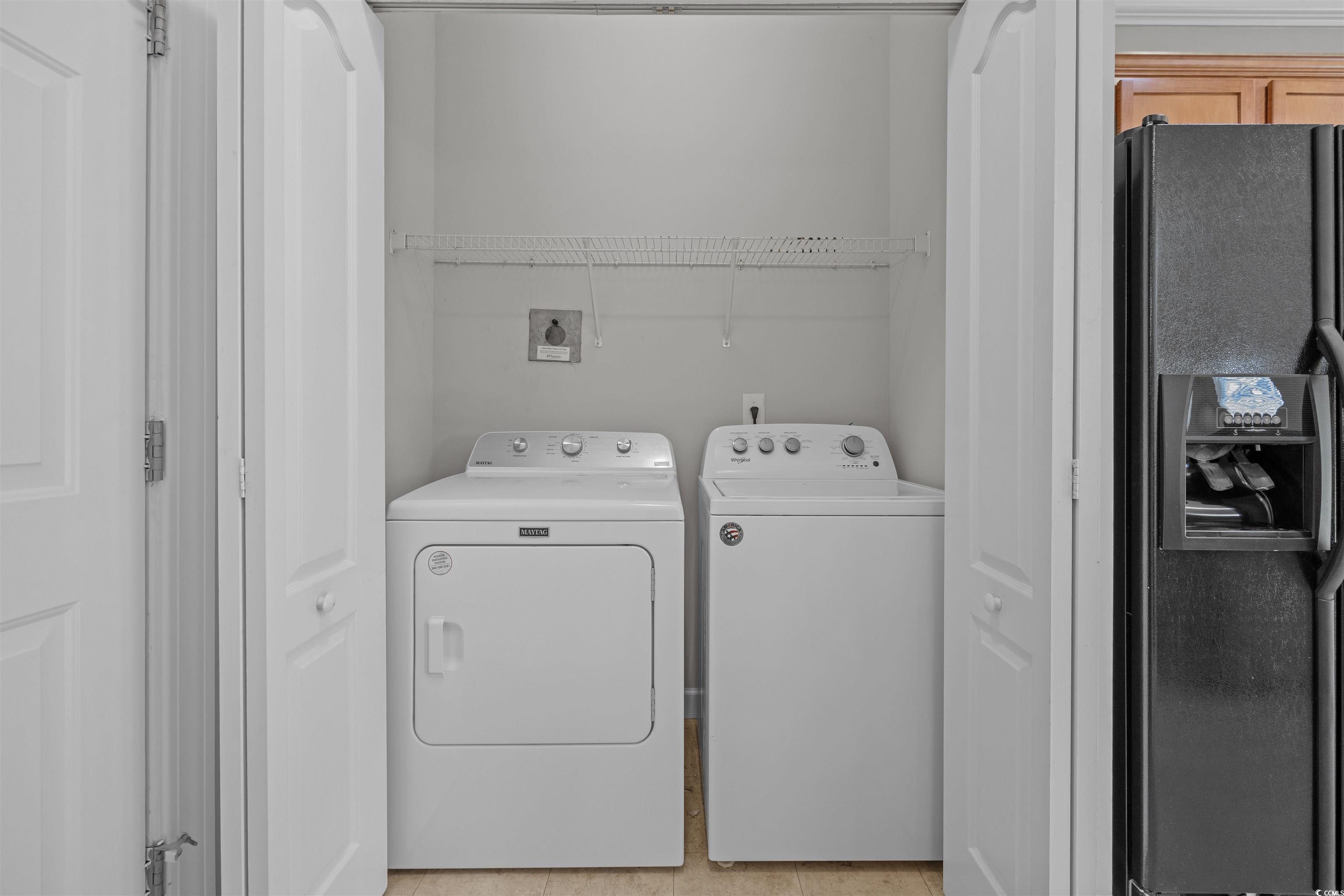1060 Fairway Lane Conway, SC 29526 - Photo 25 of 32 Laundry area featuring separate washer and dryer and light tile patterned floors