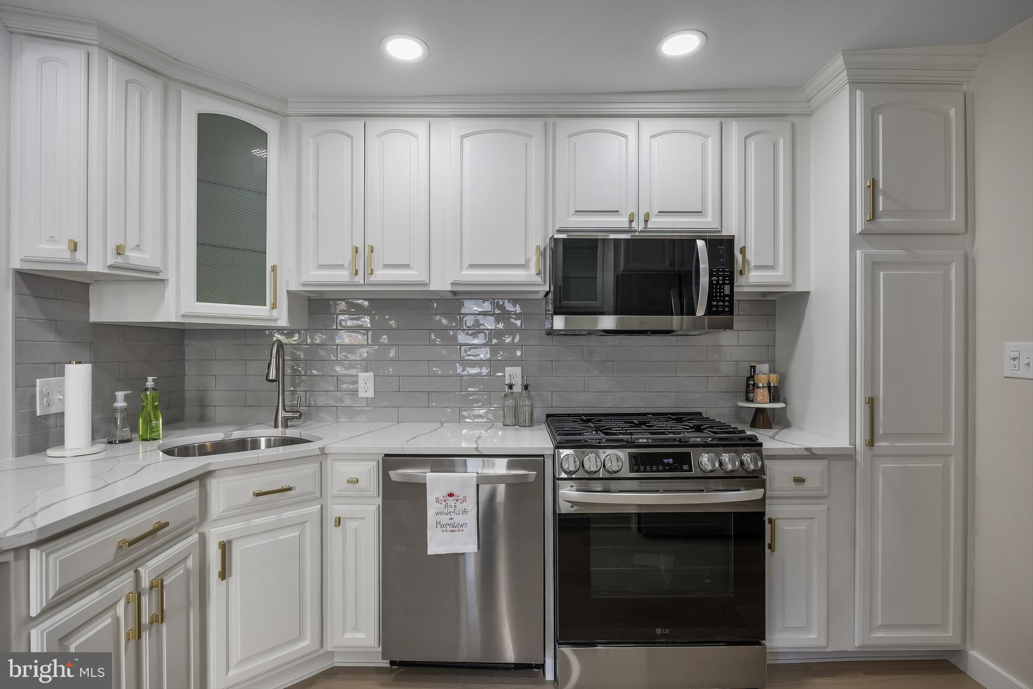 82 East 3rd Street Moorestown, NJ 08057 - Photo 16 of 33 a kitchen with cabinets stainless steel appliances and sink