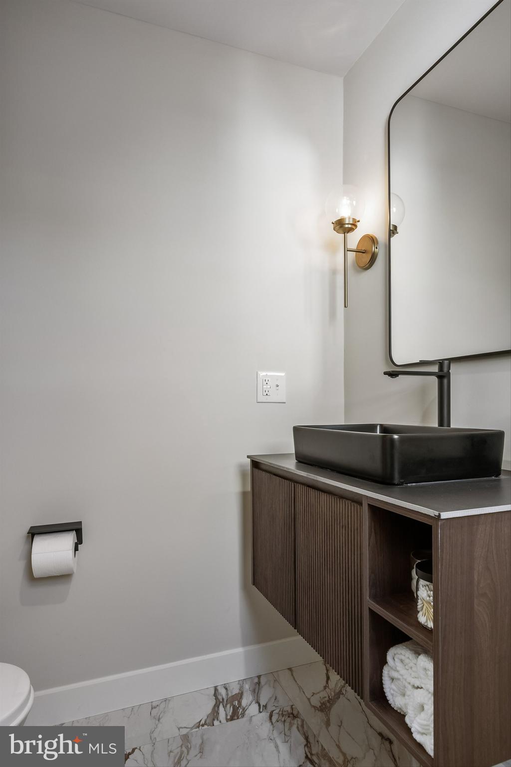 82 East 3rd Street Moorestown, NJ 08057 - Photo 24 of 33 a bathroom with a sink and mirror