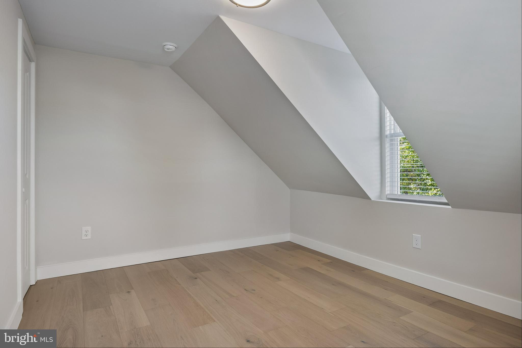 82 East 3rd Street Moorestown, NJ 08057 - Photo 25 of 33 a view of a big room with wooden floor and windows