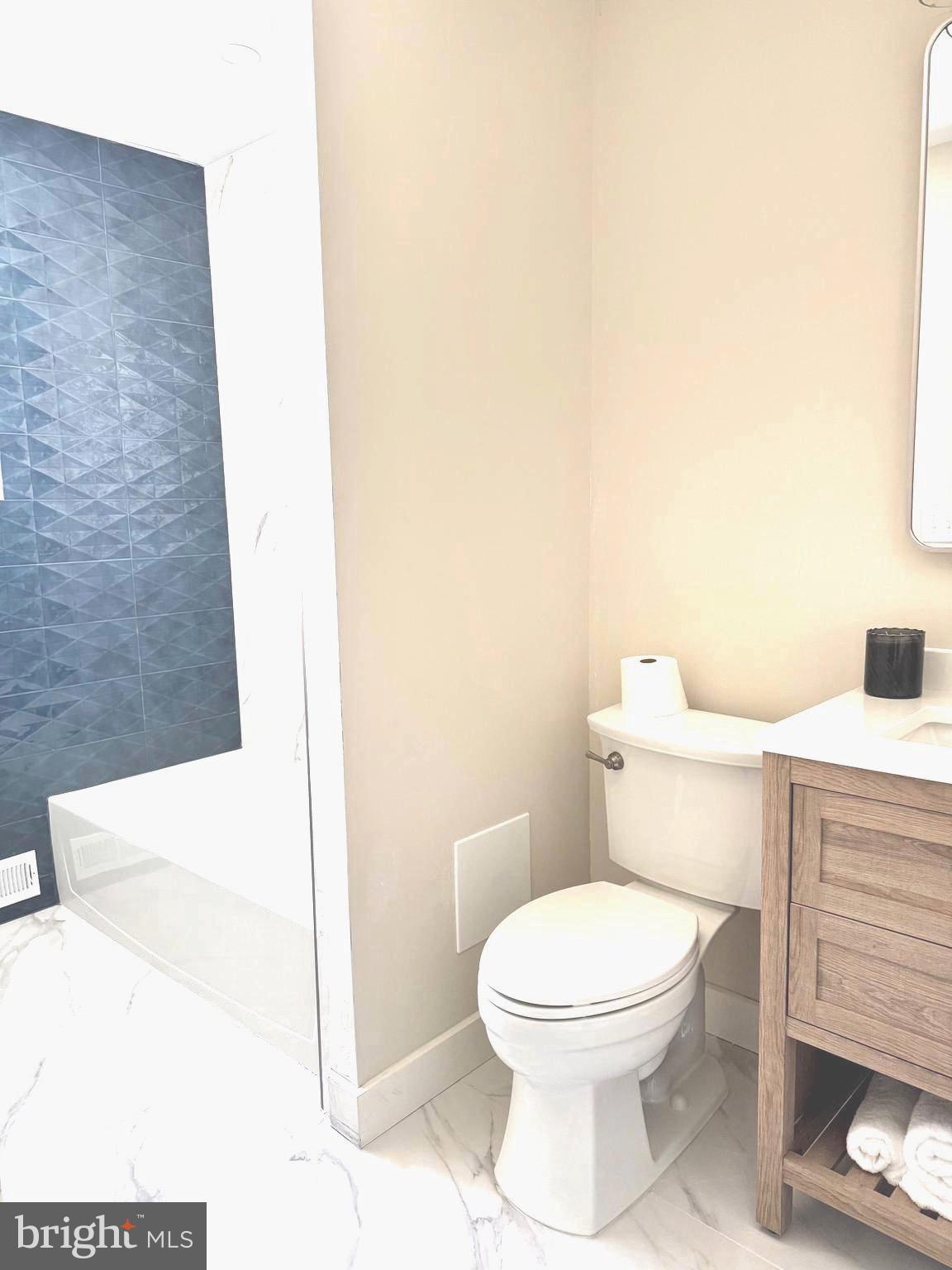 82 East 3rd Street Moorestown, NJ 08057 - Photo 28 of 33 a white toilet sitting next to a white sink