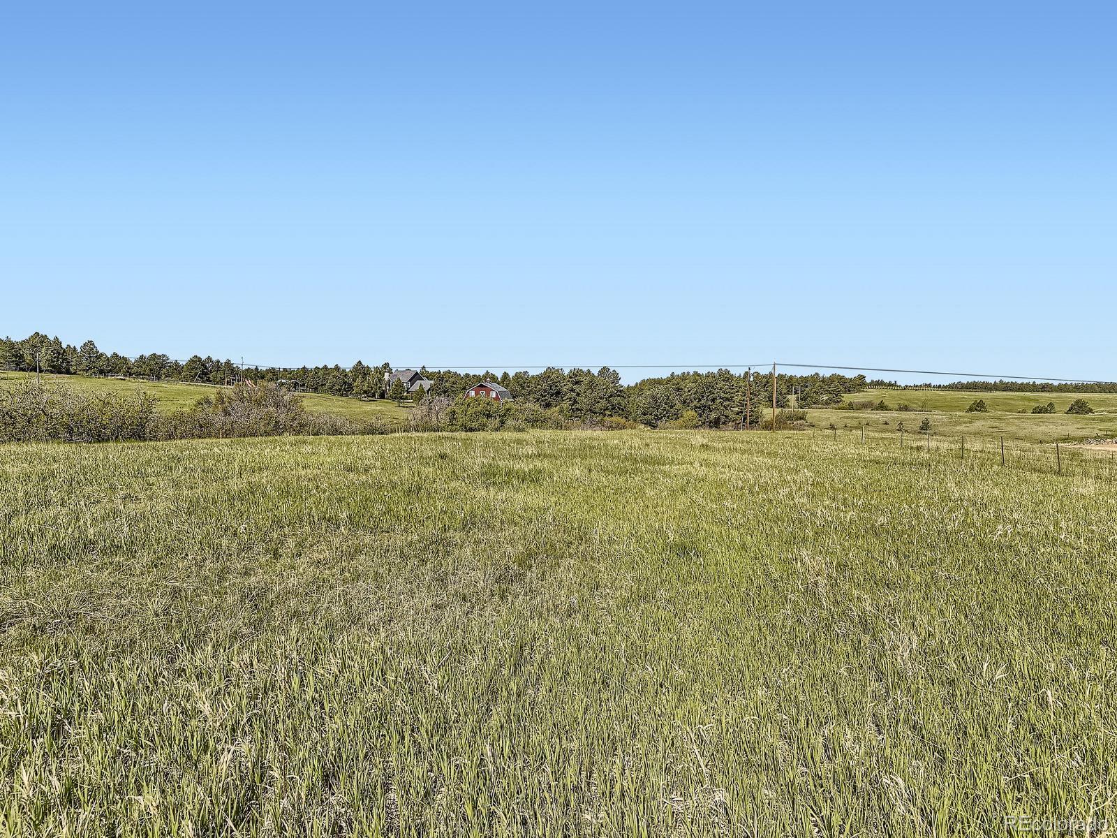 104 Bill Davis Road Franktown, CO 80116 - Photo 12 of 14 a view of an ocean and beach