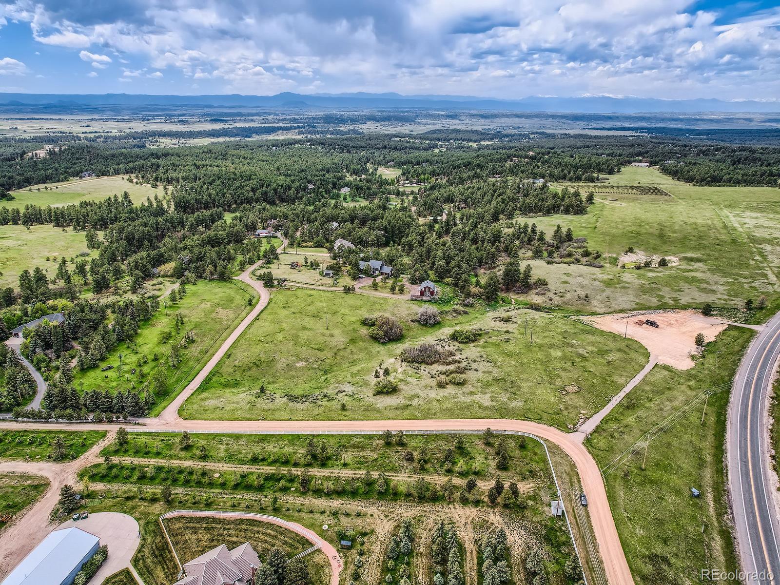 104 Bill Davis Road Franktown, CO 80116 - Photo 2 of 14 a view of a city