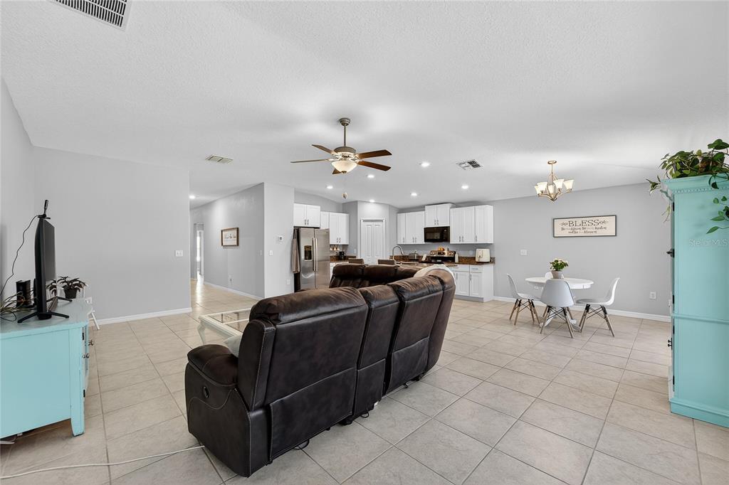 1728 Fred Ives Street Ruskin, FL 33570 - Photo 23 of 78 a living room with furniture