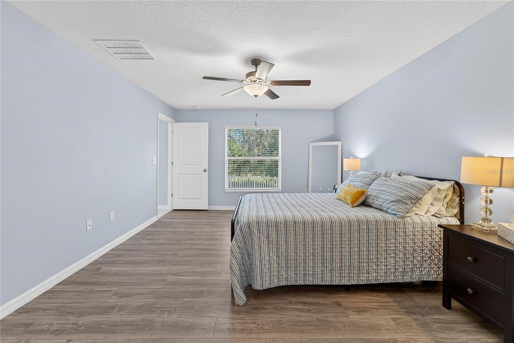 1728 Fred Ives Street Ruskin, FL 33570 - Photo 39 of 78 a bedroom with a bed and window