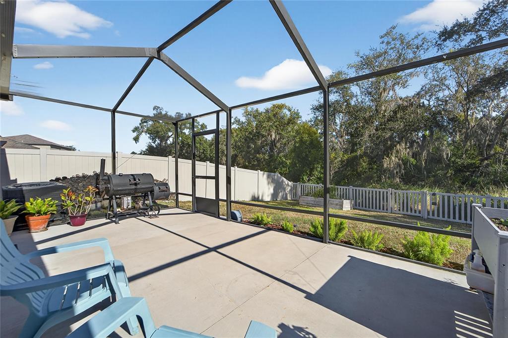 1728 Fred Ives Street Ruskin, FL 33570 - Photo 44 of 78 a view of swimming pool with seating area and furniture in the background
