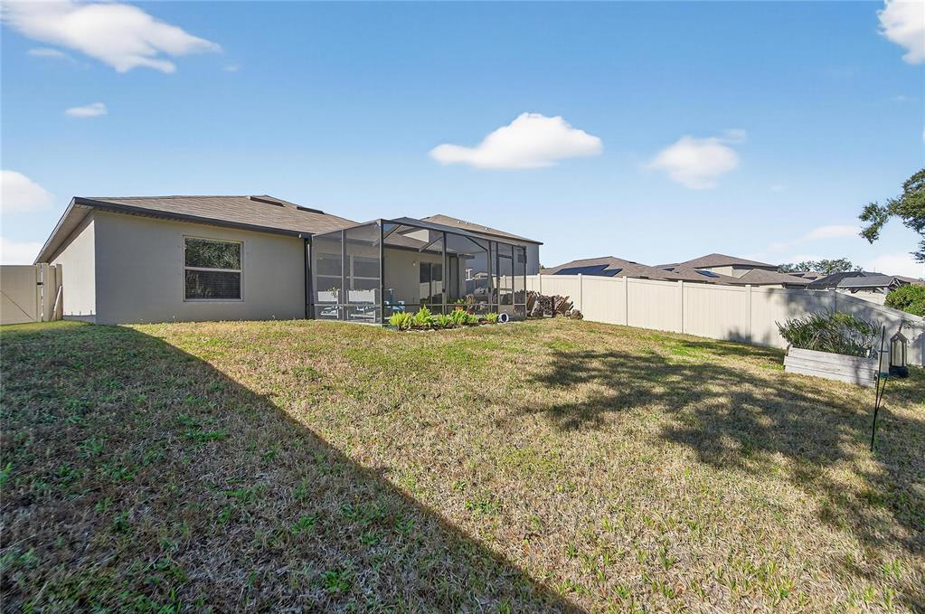 1728 Fred Ives Street Ruskin, FL 33570 - Photo 5 of 78 a view of a house with a yard
