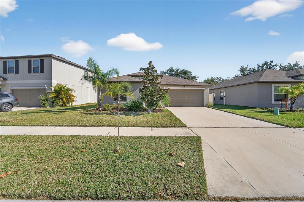 1728 Fred Ives Street Ruskin, FL 33570 - Photo 6 of 78 a view of a house with a yard