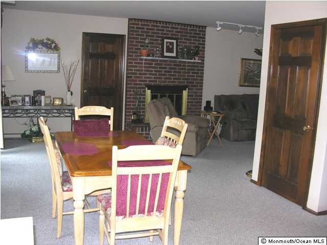 164 South New Prospect Road Jackson, NJ 08527 - Photo 3 of 3 a view of a livingroom with furniture and a fireplace