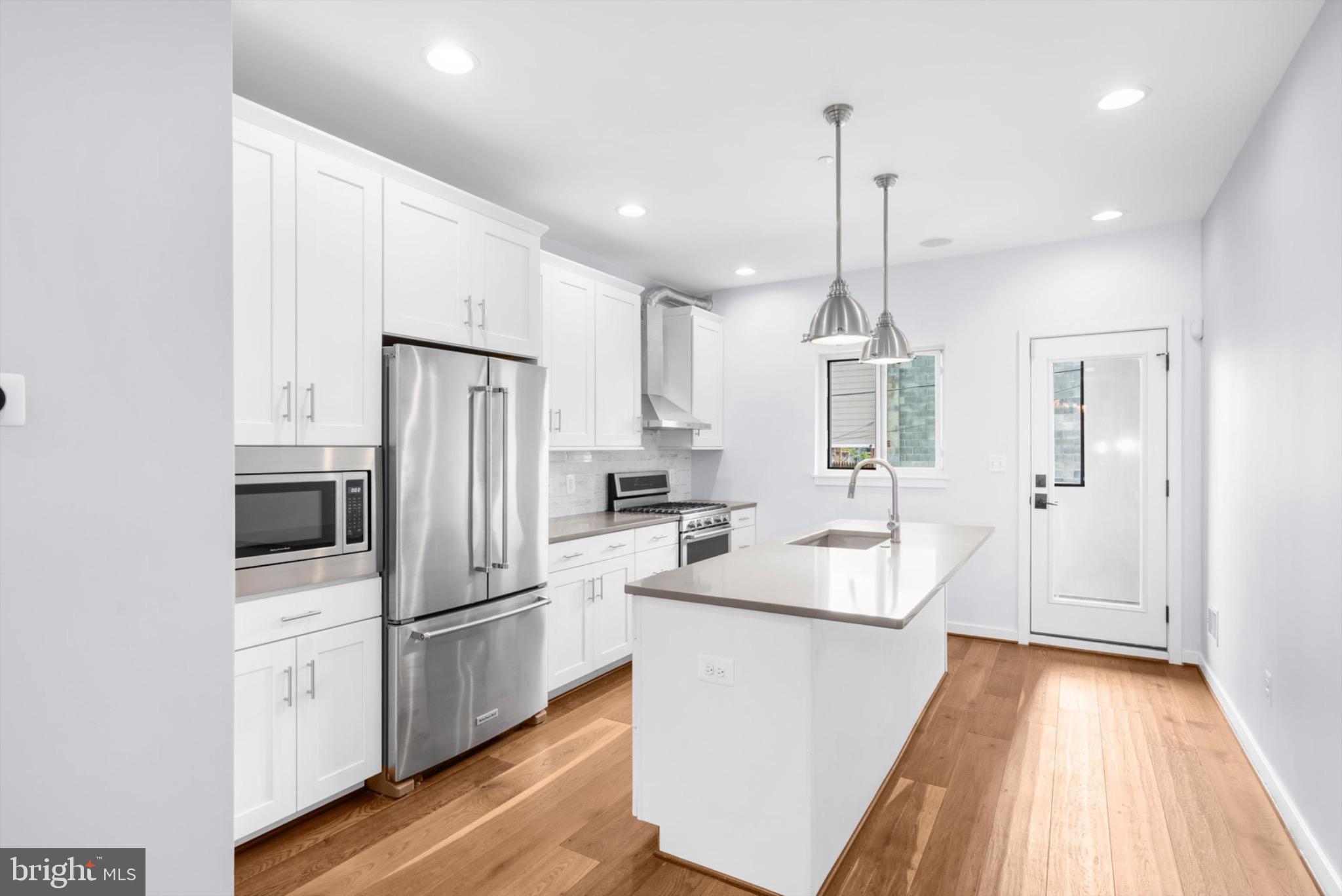 2317 East Fairmount Avenue Baltimore, MD 21224 - Photo 13 of 30 2nd level - Kitchen with SS appliances