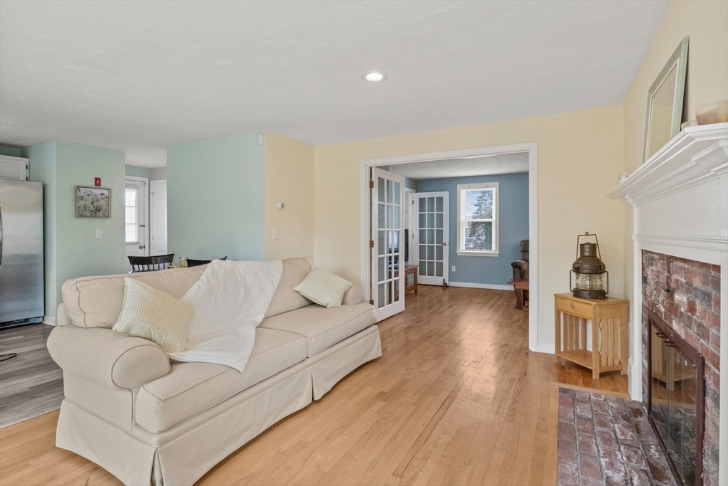 60 Tupper Avenue Sandwich, MA 02563 - Photo 11 of 35 a living room with furniture and a wooden floor