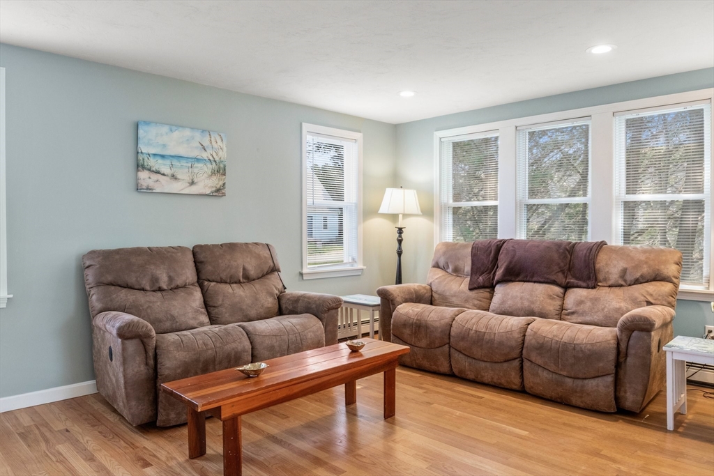 60 Tupper Avenue Sandwich, MA 02563 - Photo 13 of 35 a living room with furniture and a large window