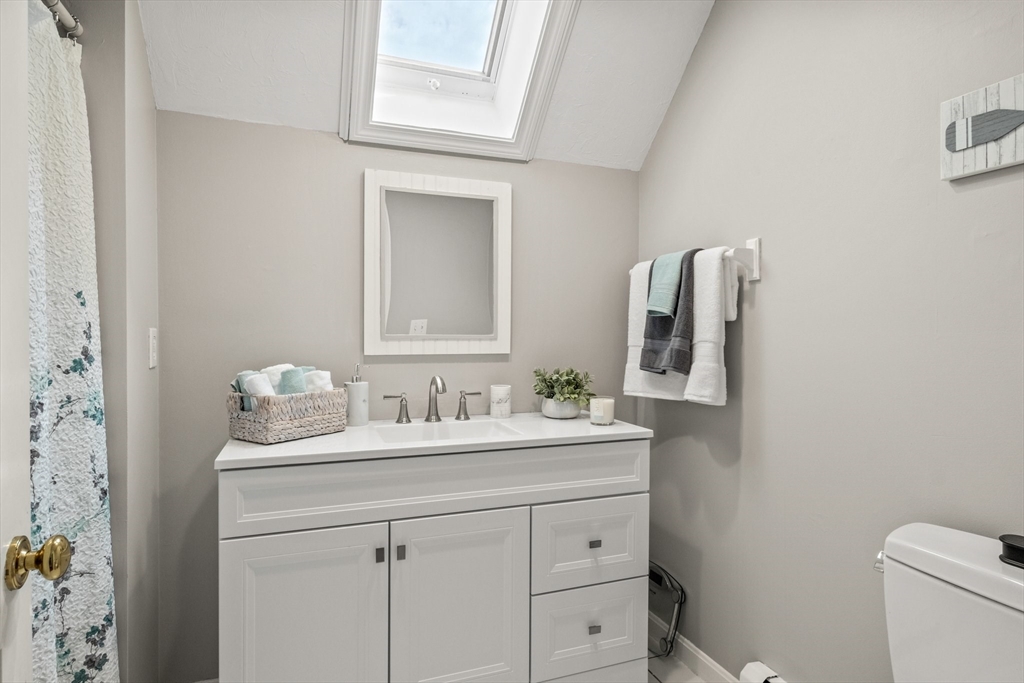 60 Tupper Avenue Sandwich, MA 02563 - Photo 18 of 35 a bathroom with a sink toilet and mirror