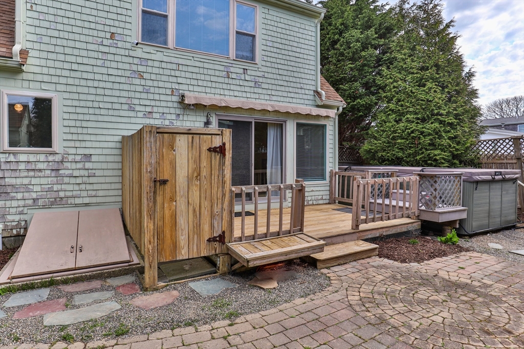 60 Tupper Avenue Sandwich, MA 02563 - Photo 27 of 35 a backyard of a house with barbeque oven