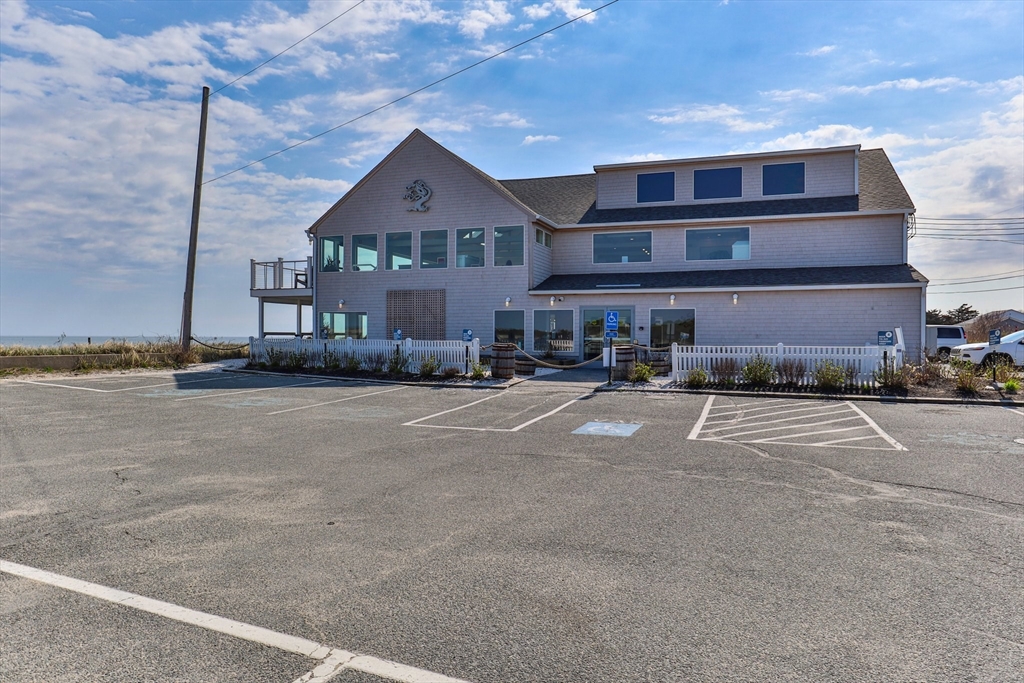 60 Tupper Avenue Sandwich, MA 02563 - Photo 34 of 35 a front view of a house with a yard