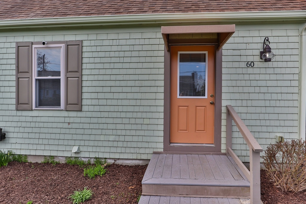 60 Tupper Avenue Sandwich, MA 02563 - Photo 5 of 35 a front view of a house with a yard
