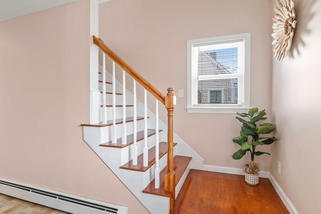 60 Tupper Avenue Sandwich, MA 02563 - Photo 7 of 35 a view of staircase with white walls and a window