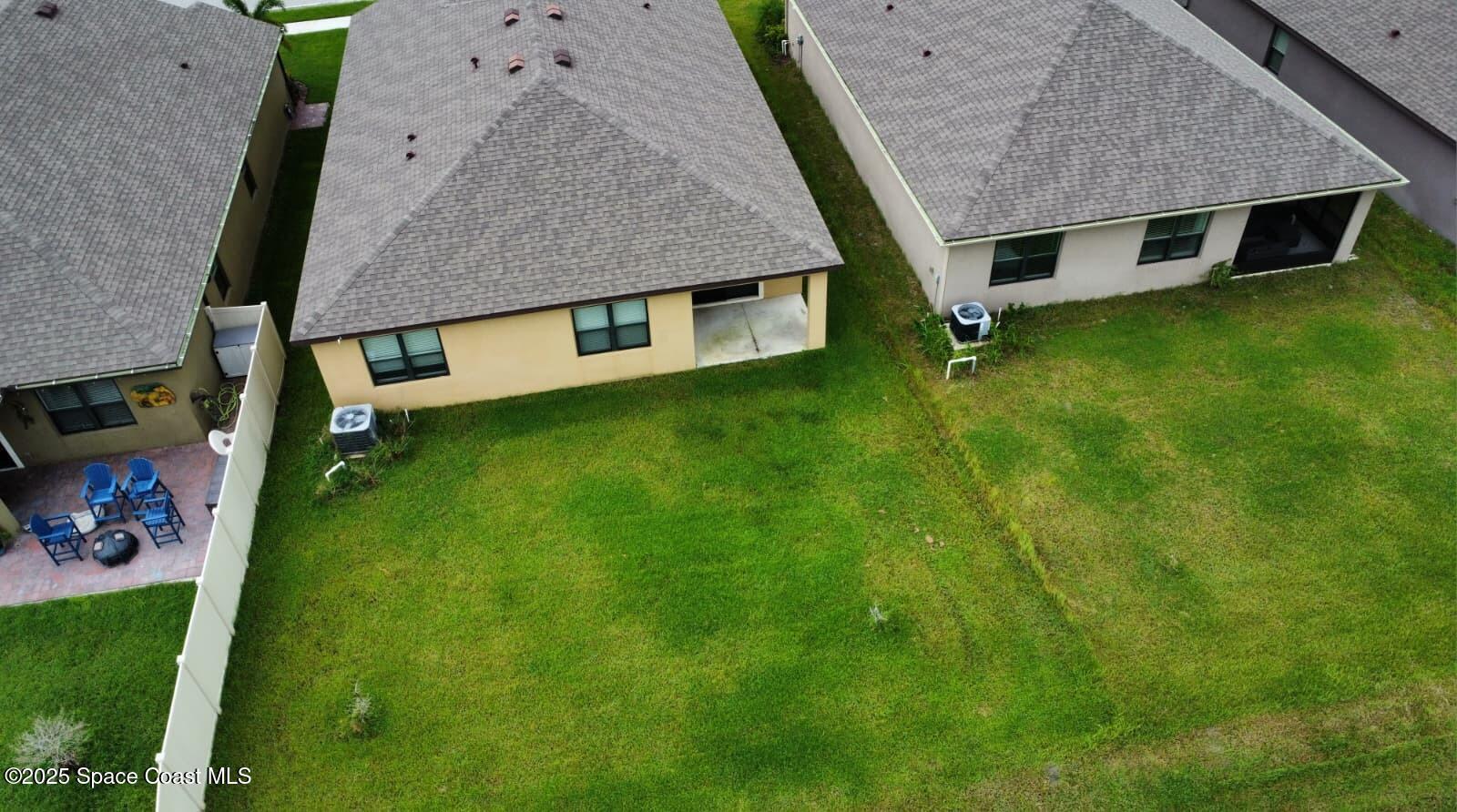 2073 Farmhouse Road Southeast Palm Bay, FL 32909 - Photo 5 of 14 an aerial view of residential house with outdoor space