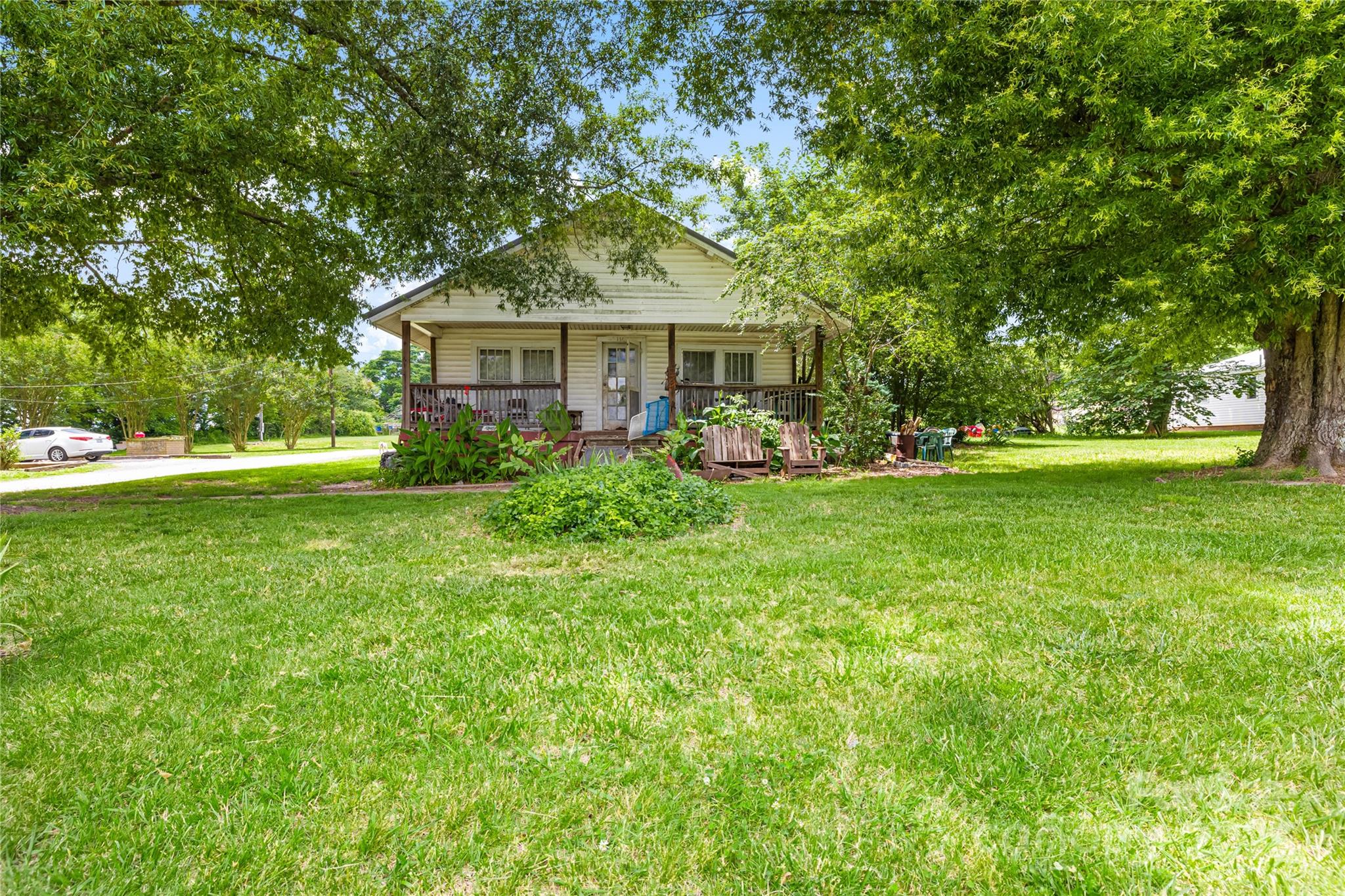 116 Webb Road Shelby, NC 28152 - Photo 2 of 15 a front view of a house with garden