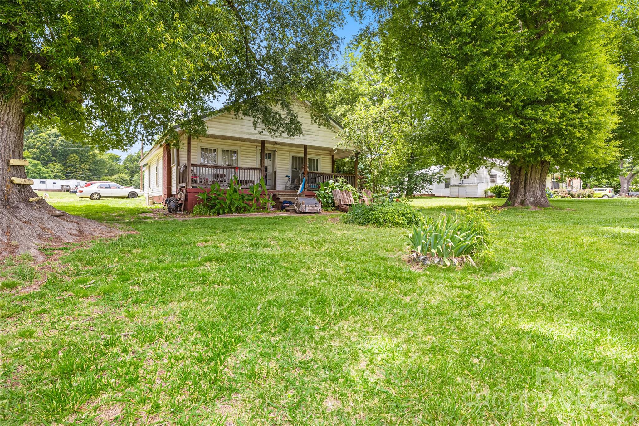 116 Webb Road Shelby, NC 28152 - Photo 3 of 15 a view of a house with a big yard and large trees
