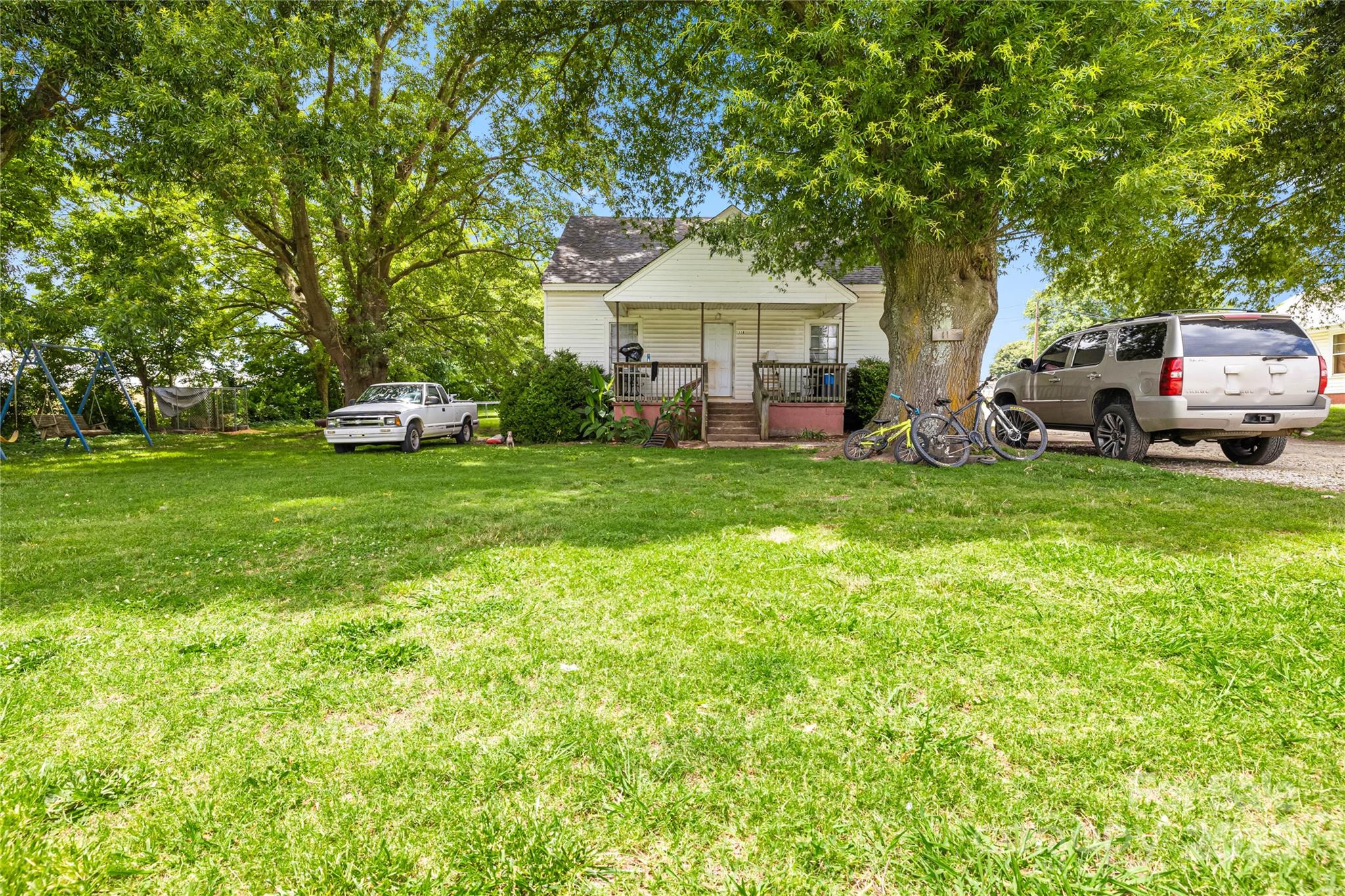 116 Webb Road Shelby, NC 28152 - Photo 6 of 15 a view of a house with backyard and sitting area