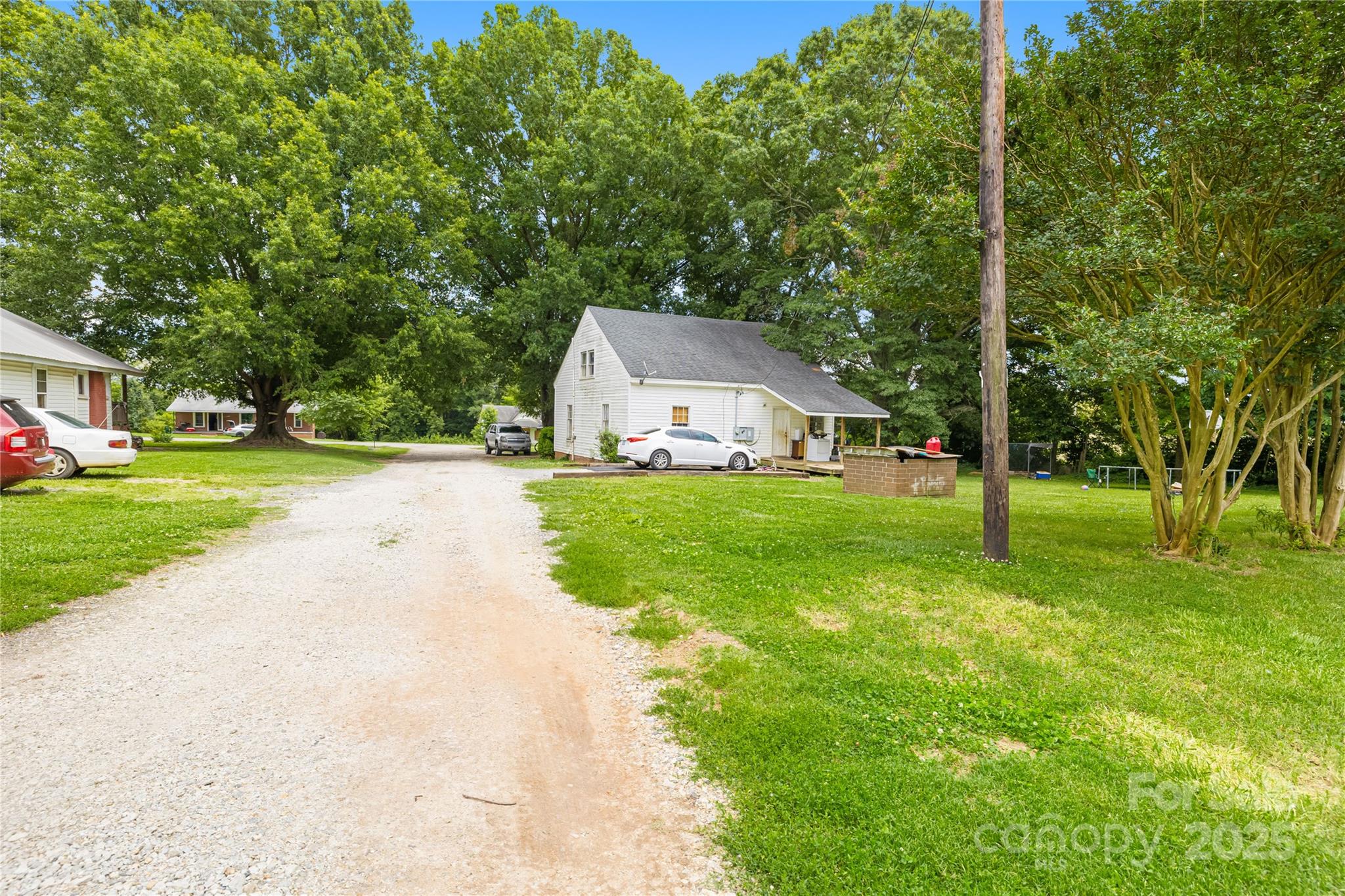 116 Webb Road Shelby, NC 28152 - Photo 8 of 15 a view of a house with a yard and tree s