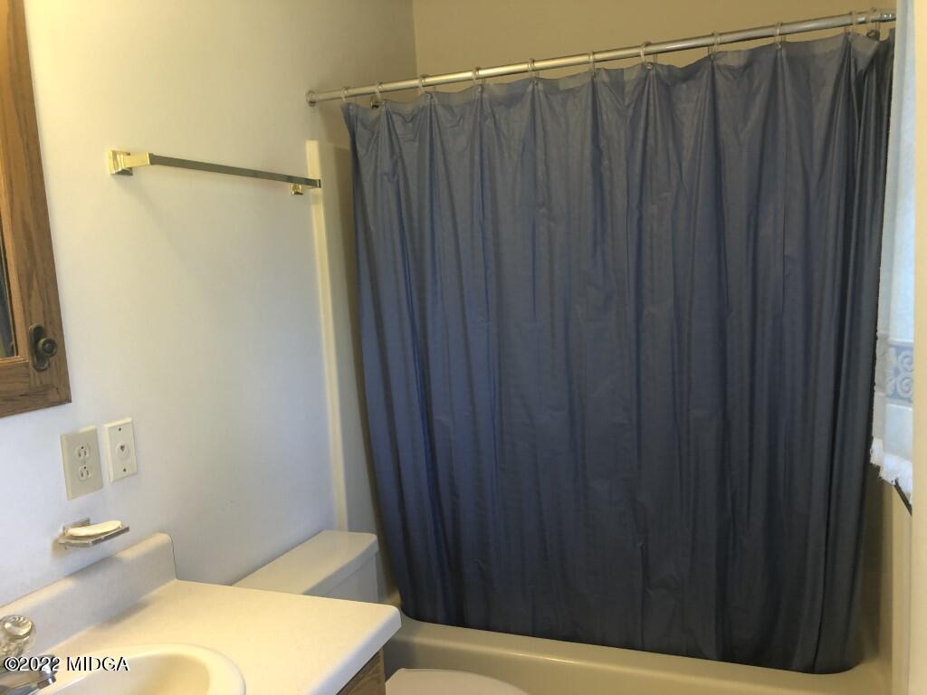1589 Hamlin Road Lizella, GA 31052 - Photo 17 of 25 a bathroom with a shower and a toilet
