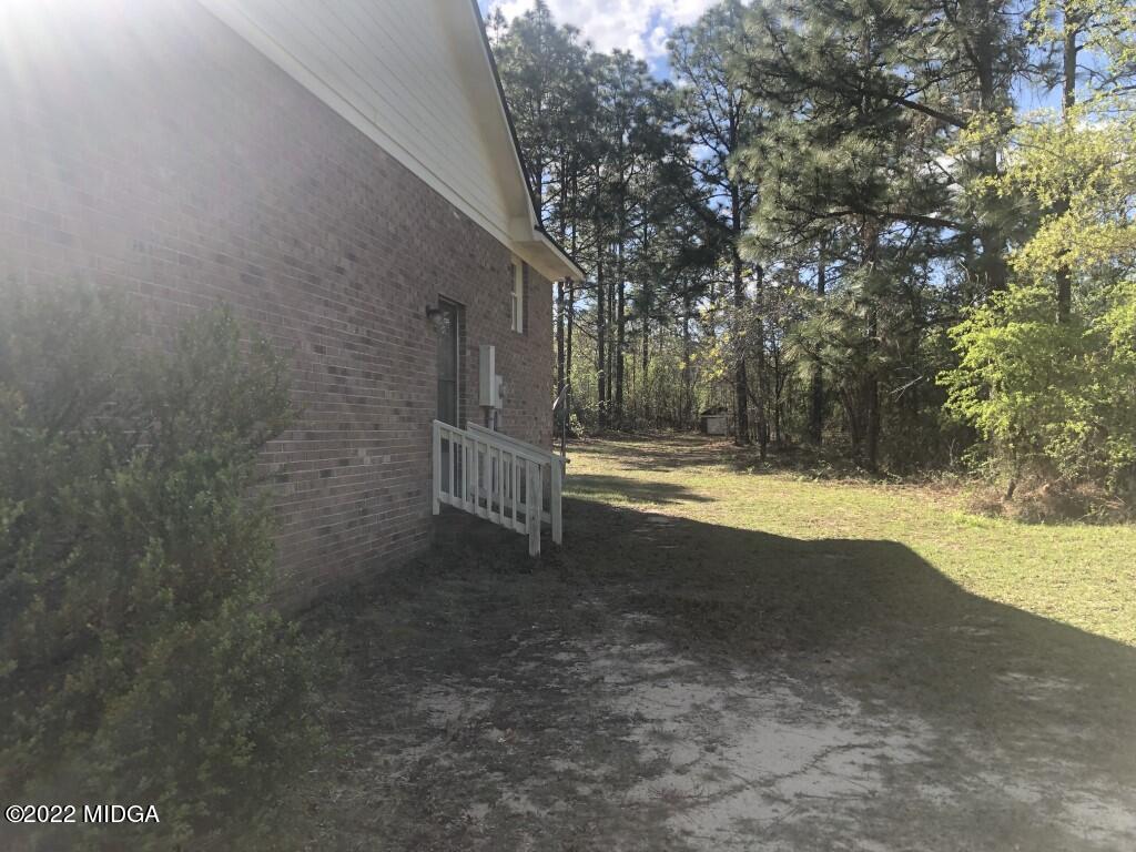 1589 Hamlin Road Lizella, GA 31052 - Photo 25 of 25 a view of yard and tree