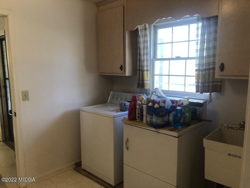 1589 Hamlin Road Lizella, GA 31052 - Photo 8 of 25 a room with storage and utility