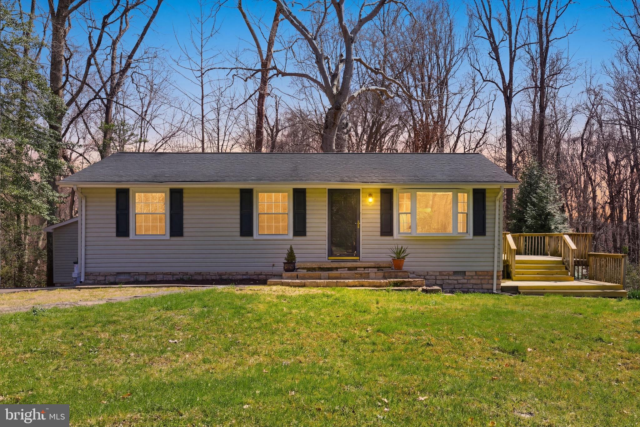 7012 Stanley Road King George, VA 22485 - Photo 1 of 37 Charming home nestled in nature's embrace.