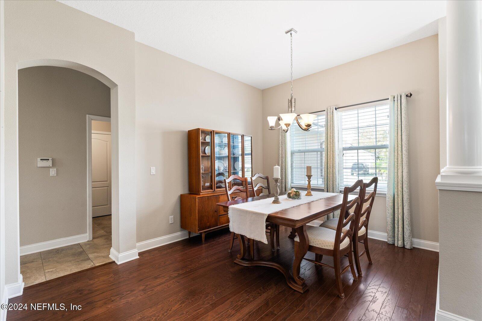 273 Parkwood Circle St. Augustine, FL 32086 - Photo 11 of 34 a view of a dining room with furniture window and wooden floor