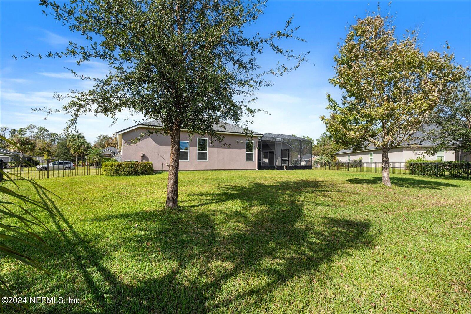 273 Parkwood Circle St. Augustine, FL 32086 - Photo 26 of 34 a view of a house with a yard