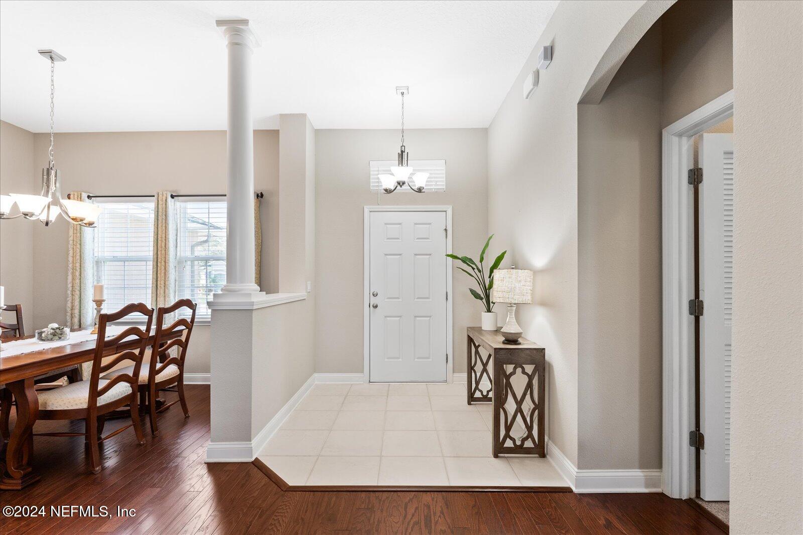 273 Parkwood Circle St. Augustine, FL 32086 - Photo 6 of 34 a view of a dining room with furniture window and wooden floor