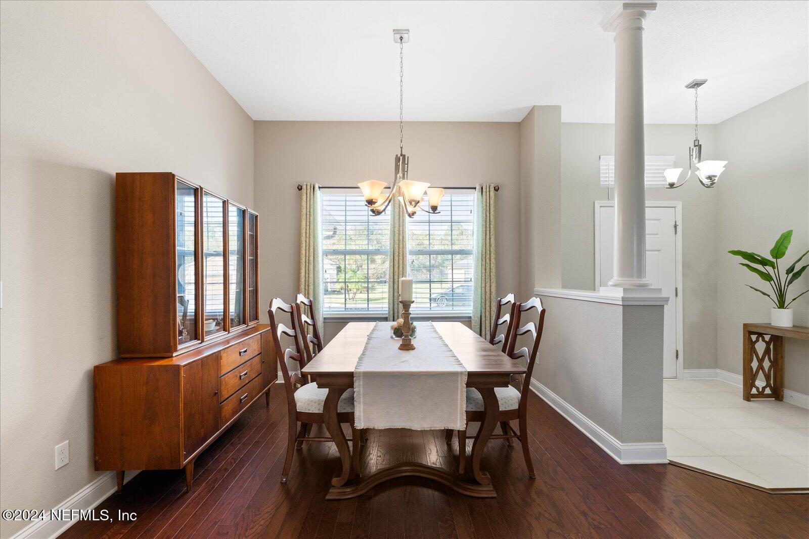273 Parkwood Circle St. Augustine, FL 32086 - Photo 10 of 34 a dining room with furniture window and wooden floor