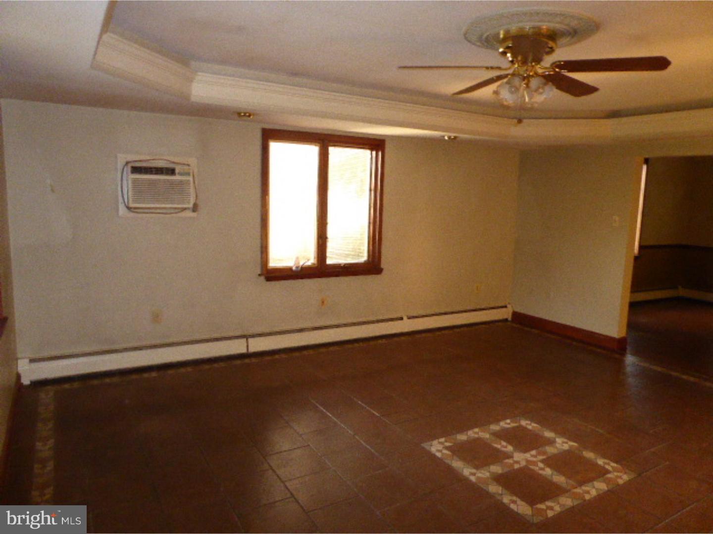 98 Ridge Road Phoenixville, PA 19460 - Photo 3 of 12 a view of an empty room with a window
