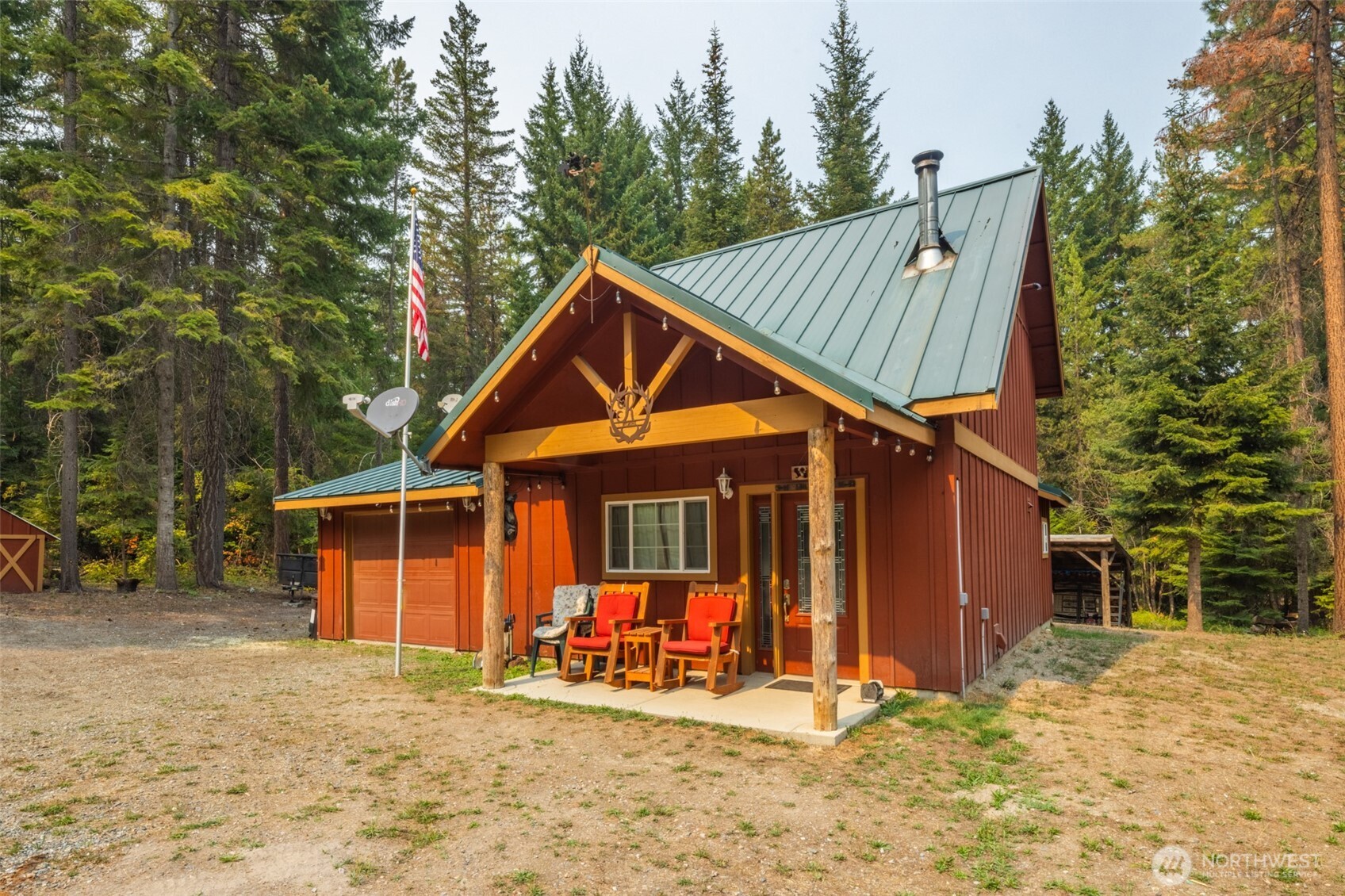 1850 Timber Mountain Loop Cle Elum, WA 98922 - Photo 1 of 32 a view of a house with backyard porch and sitting area