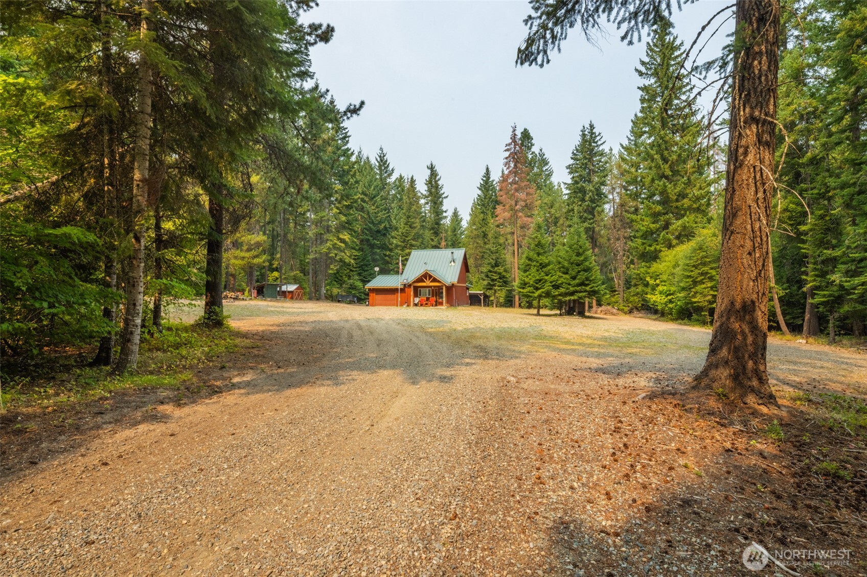 1850 Timber Mountain Loop Cle Elum, WA 98922 - Photo 14 of 32 a view of road with large trees