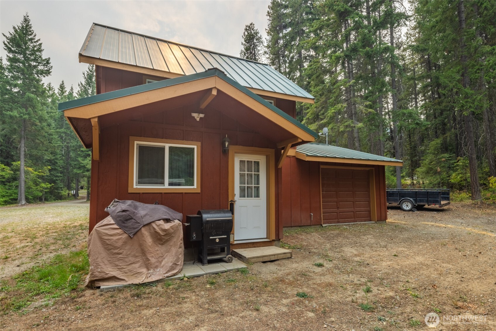 1850 Timber Mountain Loop Cle Elum, WA 98922 - Photo 16 of 32 a front view of a house with garden
