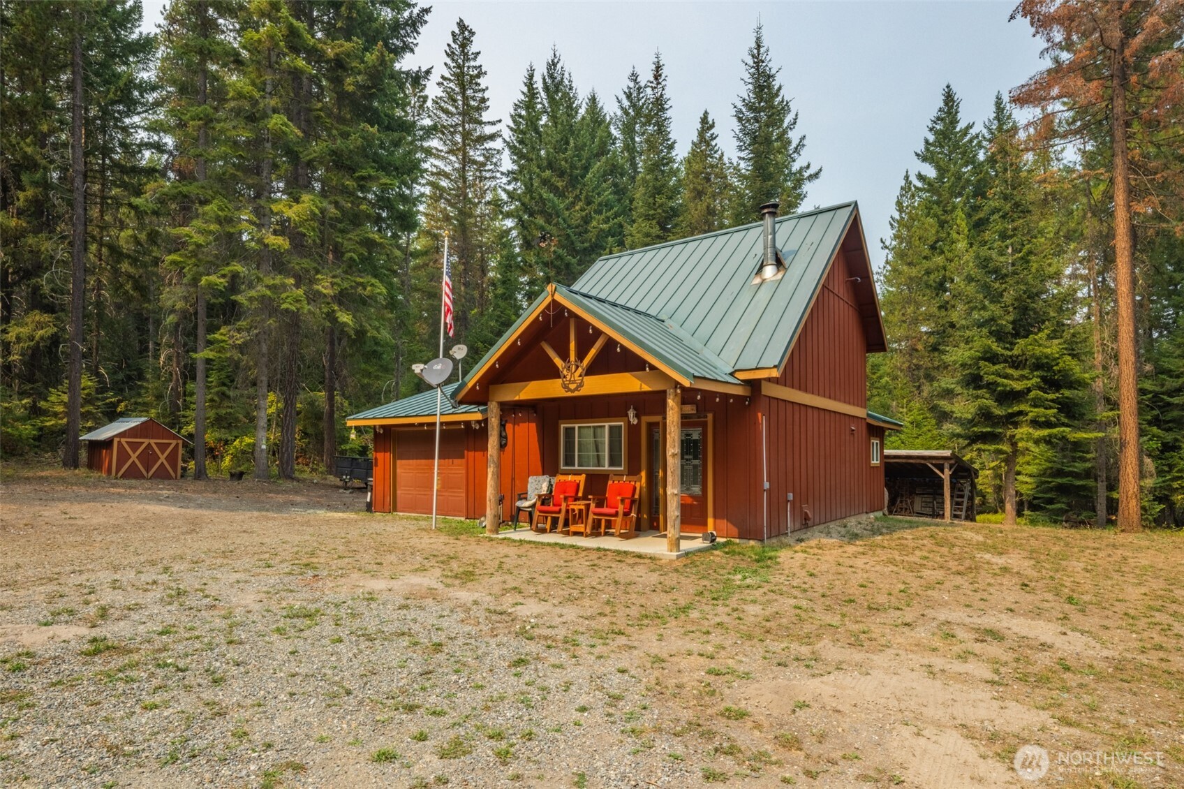 1850 Timber Mountain Loop Cle Elum, WA 98922 - Photo 2 of 32 a view of a house with a yard and trees