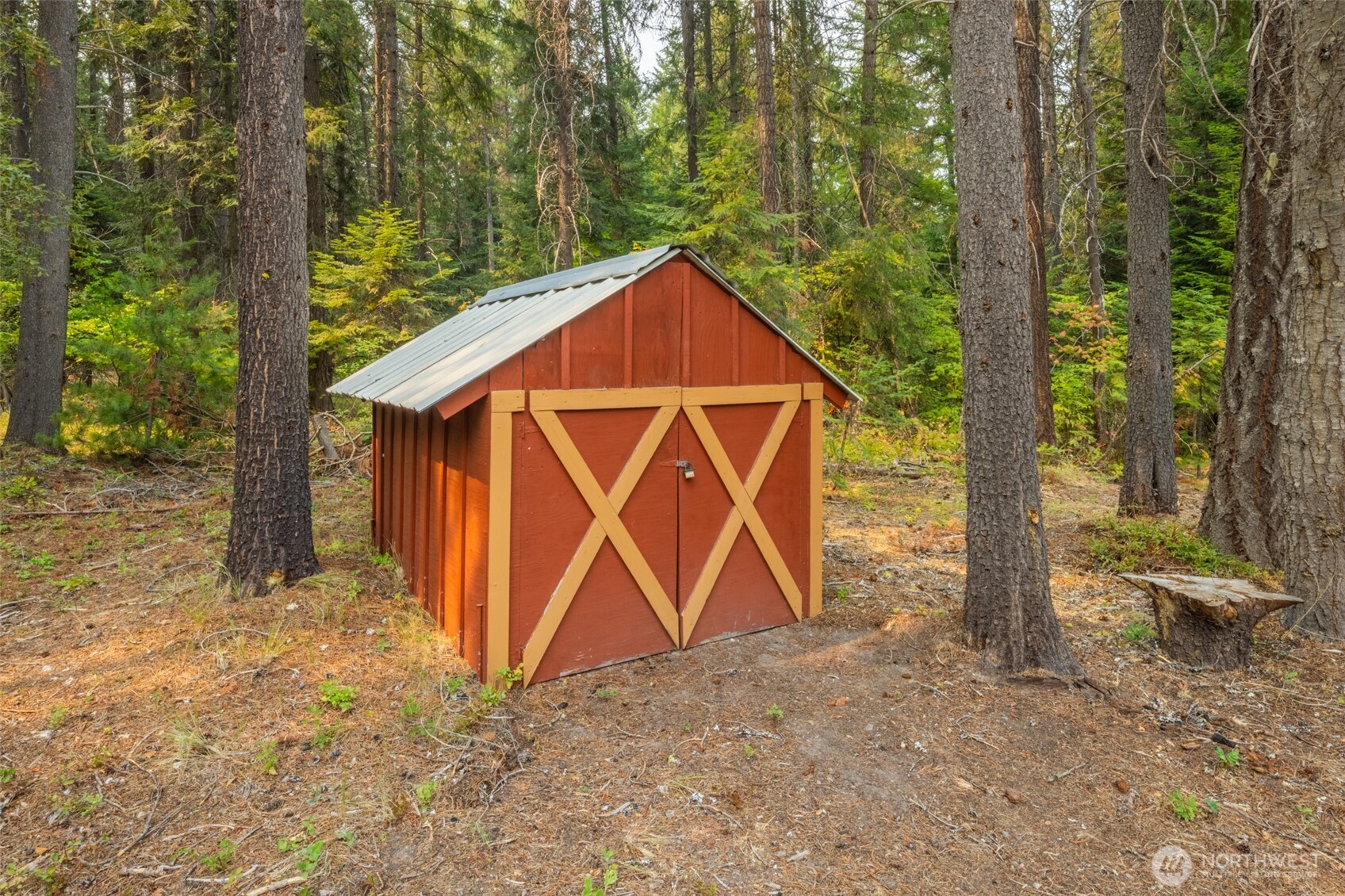 1850 Timber Mountain Loop Cle Elum, WA 98922 - Photo 23 of 32 a view of wooden house with a yard and trees