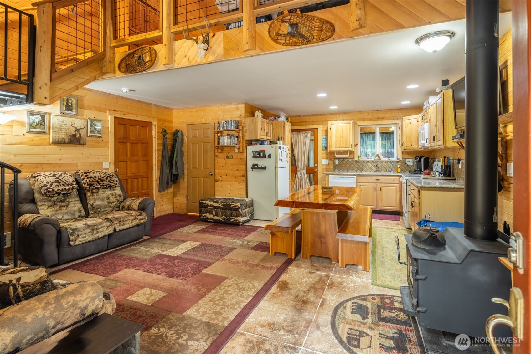 1850 Timber Mountain Loop Cle Elum, WA 98922 - Photo 4 of 32 a living room with fireplace furniture and a rug