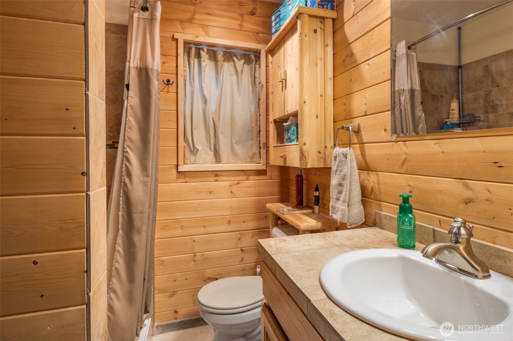 1850 Timber Mountain Loop Cle Elum, WA 98922 - Photo 8 of 32 a bathroom with a sink a toilet and shower