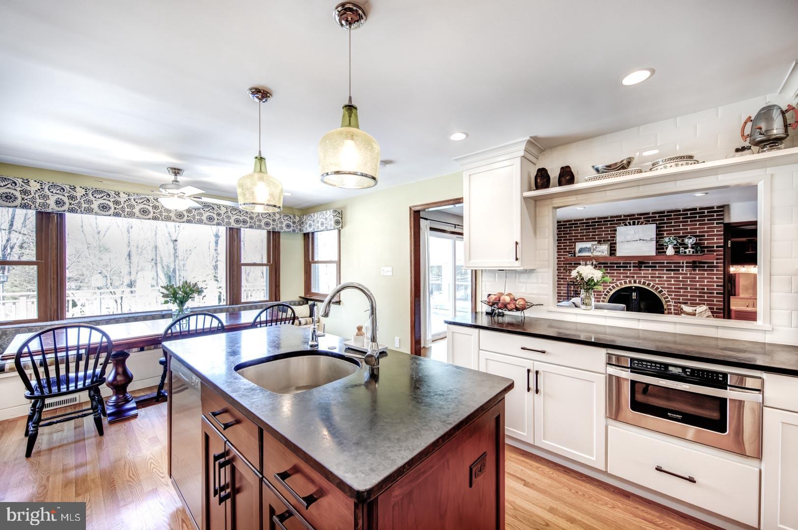 99 Springton Lake Road Media, PA 19063 - Photo 11 of 43 Kitchen w/Built-In Banquette Overlooking Yard