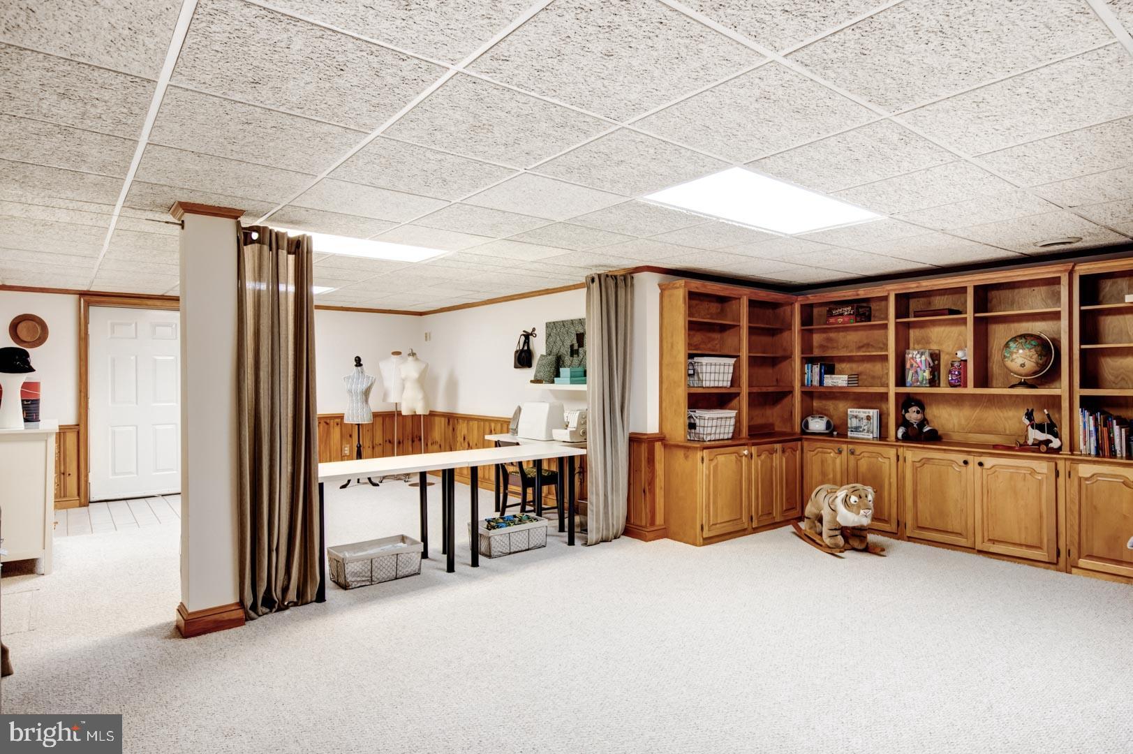 99 Springton Lake Road Media, PA 19063 - Photo 30 of 43 Finished Lower Level w/Built-In Shelves